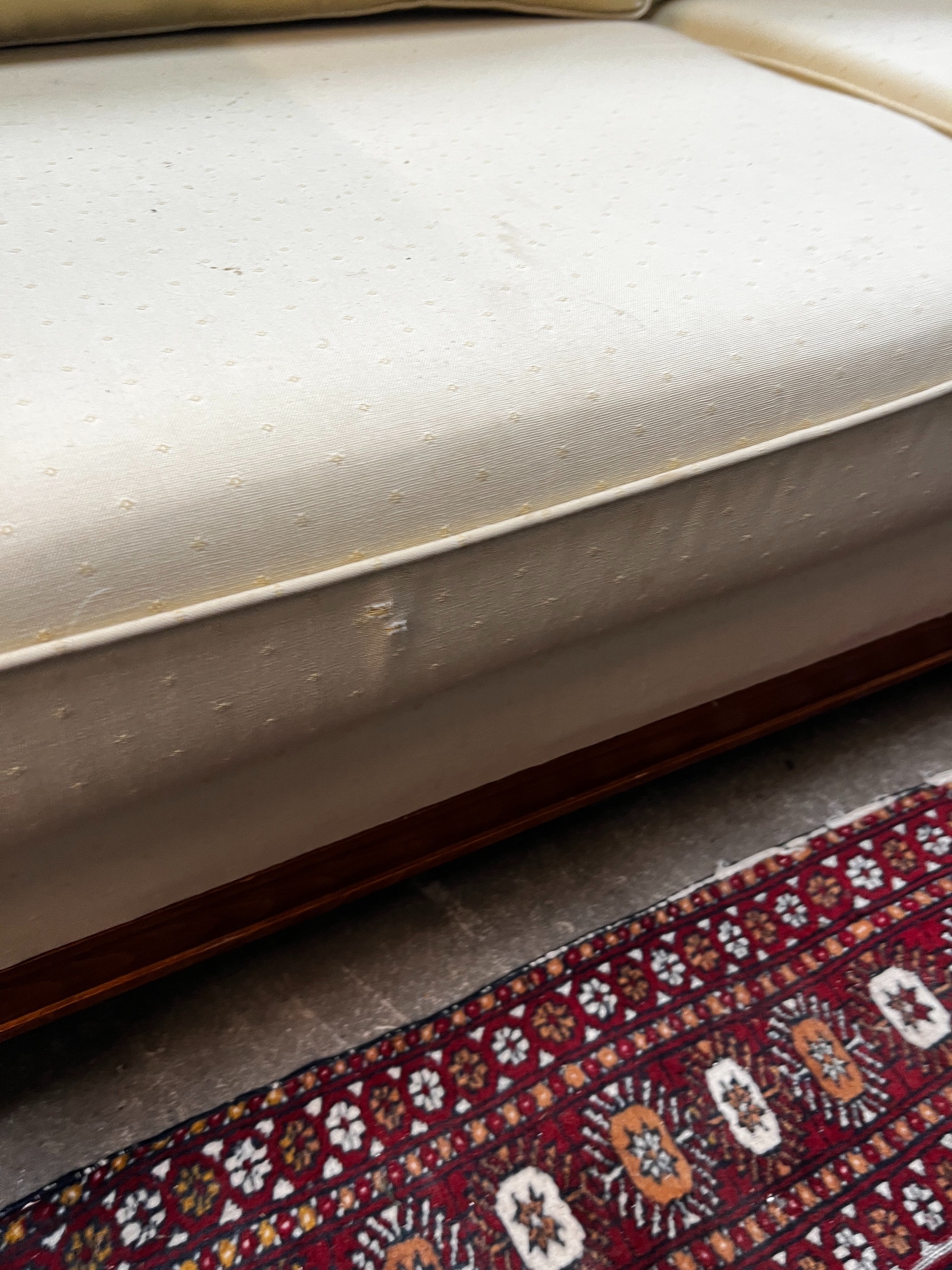 A reproduction walnut and beech two seater settee, length 174cm, depth 86cm, height 74cm